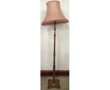An oak standard lamp 