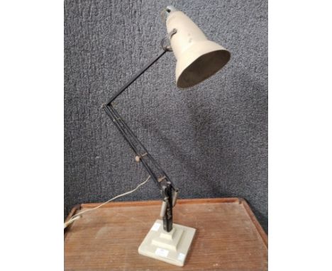 A Herbert Terry &amp; Sons Ltd. two tone metal anglepoise desk lamp, on three step base