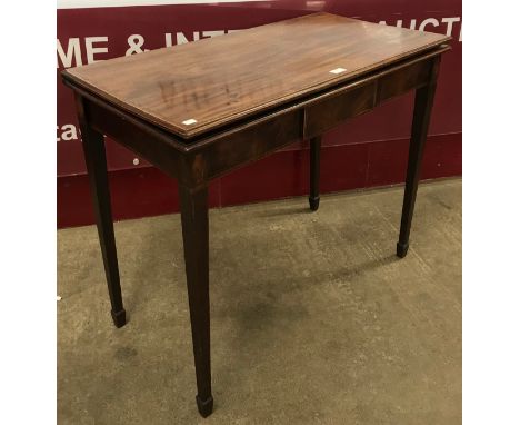 An Edward VII inlaid mahogany rectangular fold over card table 