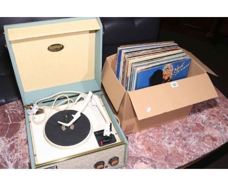 Dansette table top record player with a box of LP records.