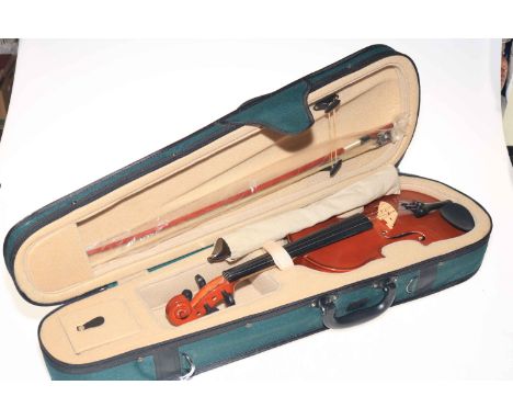 Violin and bow in case, together with a recorder.