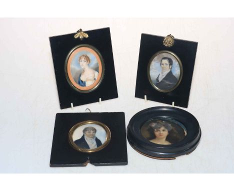 Four ebonised framed portrait miniatures.