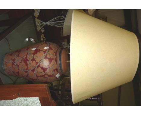 Large lamp with shade and decorative foliage design