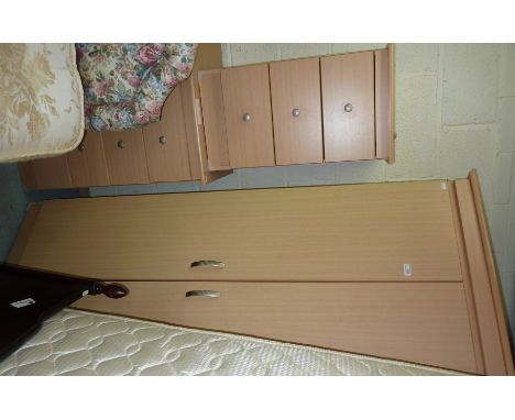 Beech laminate bedroom suite comprising of double door wardrobe, bedside chest of 3 drawers and a chest of 4 drawers