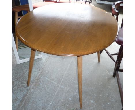 Ercol lightwood circular top dining table