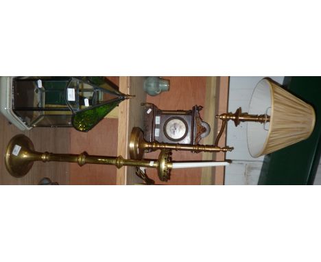 Large brass candlestick and a brass table lamp