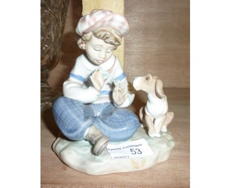 Lladro figure of a young boy with a dog