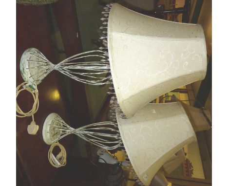 2 twisted metal work lamp bases with cream shades