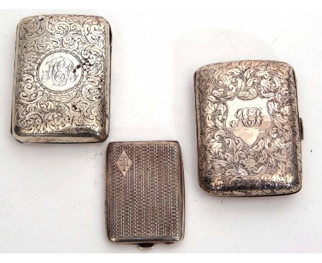 Mixed Lot: comprising two various silver cigarette cases, each of hinged rectangular form with all over engraved foliate deco