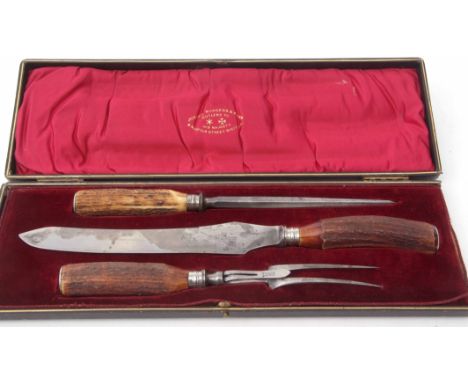 Early 20th century cased three-piece carving set, Joseph Rodgers &amp; Sons - Sheffield, comprising safety fork, carving knif
