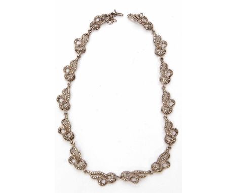 Vintage marcasite set necklace, a design of 14 individual ribbon scrolls, stamped Sterling, 39cm long  