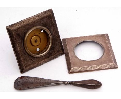 Mixed Lot: two various hallmarked silver desk clock mounts, each of engine turned square form, together with a silver handled