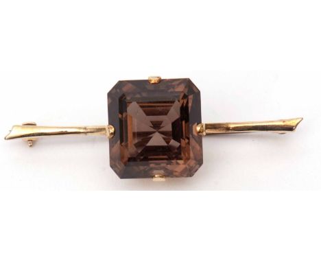 Vintage smokey quartz bar brooch, the square shaped faceted quartz claw set in a basket mount and raised on a 9ct stamped bar