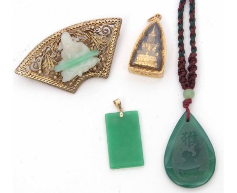 Mixed Lot: three modern jade type pendants, together with a jade and filigree brooch (4) 