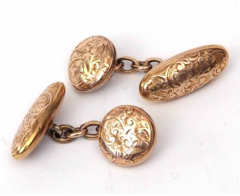 Vintage pair of gents cuff links, stamped 10K, torpedo and circular shaped with chased and engraved detail, chain connectors,