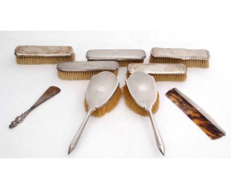 Mixed Lot: comprising two hair brushes, two plus two clothes brushes, further single clothes brush, silver backed comb, silve