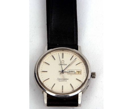 Late 20th century quartz stainless steel centre seconds calendar wrist watch, Omega "Seamaster" quartz, the quartz movement (