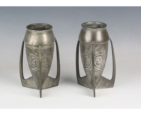 A pair of Liberty &amp; Co 'Tudric' pewter vases, designed by Archibald Knox, model number '0226', the tapering ovoid bodies 