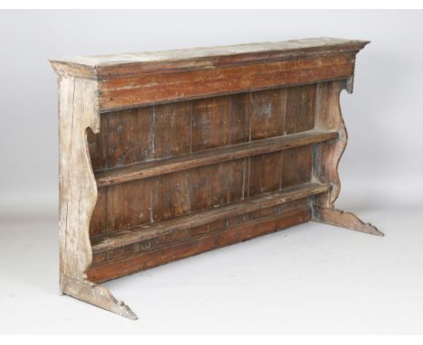 A 19th century provincial oak plate rack with a deep frieze and two shelves, height 92cm, width 170cm.Buyer’s Premium 29.4% (