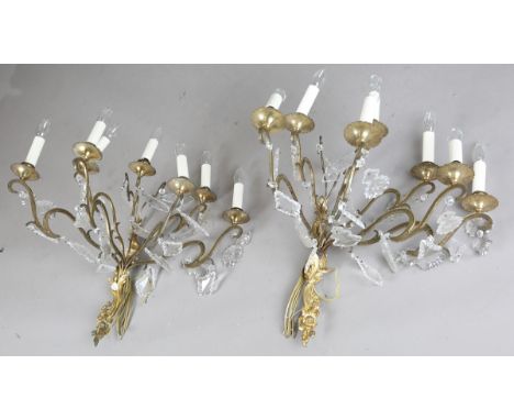 A pair of large 20th century gilt brass seven-light wall sconces, hung with substantial cut glass drops, height 64cm.Buyer’s 