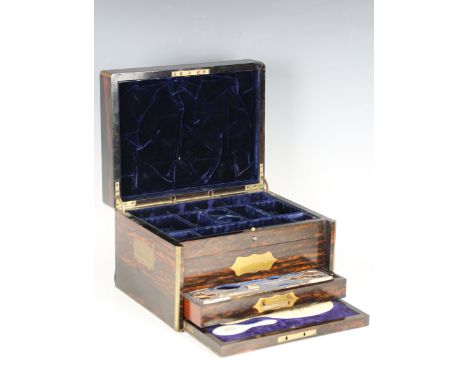 A mid-Victorian coromandel and brass bound vanity case by W. Leuchars, London, the hinged lid and partially fitted interior b