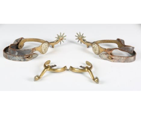 A pair of George III brass and steel mounted spurs, length 10cm, together with a pair of early 20th century brass spurs, each