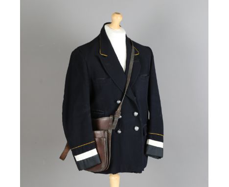 A London Bus Company ticket printer by Williamson, a matching leather satchel and a bus conductor's jacket.Buyer’s Premium 29