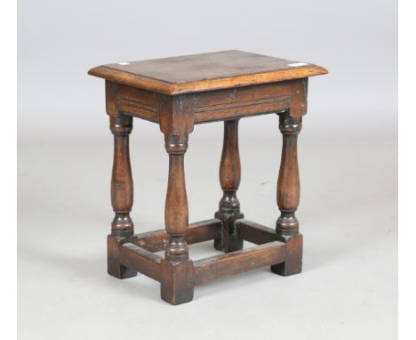 A 20th century Carolean Revival oak joint stool, height 43cm, width 38cm, depth 28.5cm.Buyer’s Premium 29.4% (including VAT @