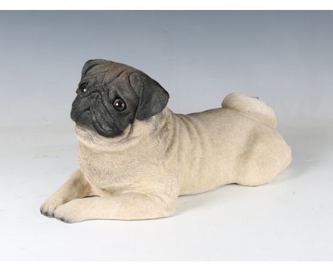 A Sandra Brue 'Sandicast' model of a recumbent pug, bearing maker's mark to underside, length 41cm.Buyer’s Premium 29.4% (inc