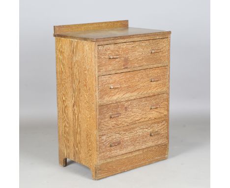 An early 20th century limed oak chest of four drawers, probably by Heals, height 96cm, width 66cm, depth 44cm.Buyer’s Premium