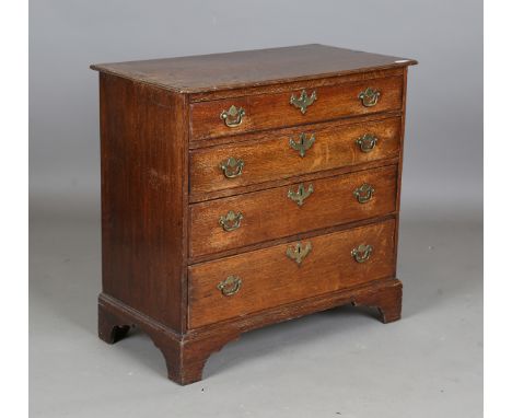 A George III oak chest of four graduated long drawers, on bracket feet, height 76cm, width 78cm, depth 43cm.Buyer’s Premium 2