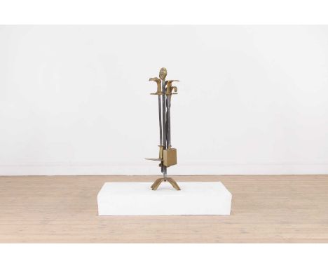 A set of modernist brass fire tools,late 20th century, the four pieces supported on a stand, stamped to the top,25cm wide23cm