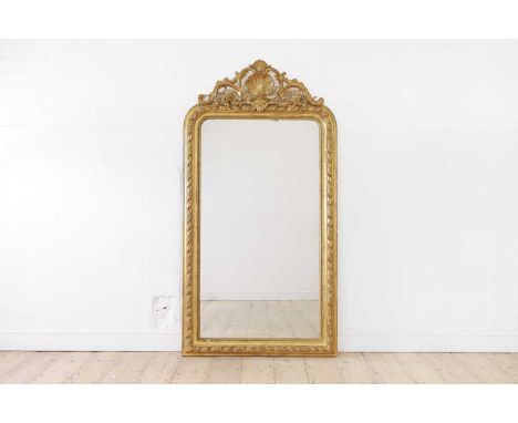 A Louis XVI-style giltwood and gesso wall mirror,late 19th/early 20th century, French, the ribbon-and-stick decorated frame w