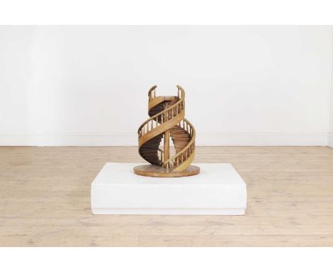 A mahogany architectural staircase model, 20th century, of double spiral form with turned balusters, on a circular base, 34cm