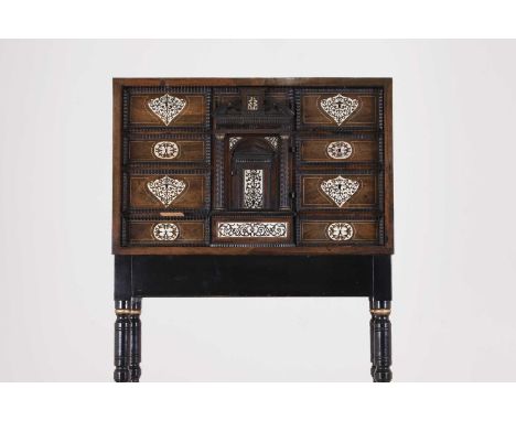 A rosewood and ivory-inlaid cabinet,late 17th/early 18th century, Italian, of rectangular form with strung top and sides, cen