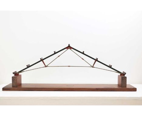 An engineering teaching model by G Cussons Ltd.,late 19th/early 20th century, of a pitched roof, with a plaque inscribed 'The