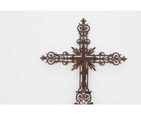 A wrought-iron crucifix,19th century, French, with pierced decoration, 87cm wide153cm high