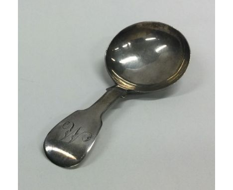 NEWCASTLE: A Georgian silver fiddle pattern caddy spoon of typical form. 1827. By Peter Lambert. Approx. 15 grams. Est. £40 -