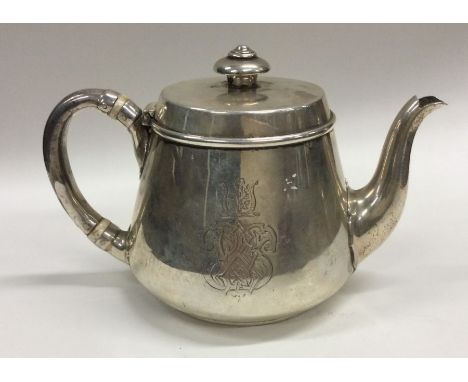 An unusual Victorian silver bachelor's teapot with hinged cover. London 1866. By Hunt &amp; Roskell. Approx. 408 grams. Est. 