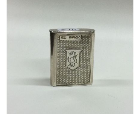 A good engine turned silver hinged top vesta case with gilt interior. London. By D&amp;F. Approx. 24 grams. Est. £40 - £60.