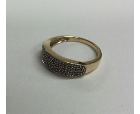 A 9 carat diamond mounted cluster ring. Approx. 2 grams. Est. £25 - £35.
