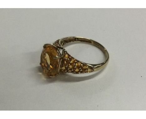 A 9 carat single stone ring in claw mount. Approx. 3 grams. Est. £50 - £80.