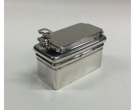 A heavy rectangular silver travelling inkwell with gilt interior. London 1831. Approx. 170 grams. Est. £150 - £200.
