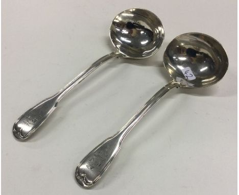 PAUL STORR: A good pair of fiddle and thread pattern silver sauce ladles. 1817. Approx. 104 grams. Est. £250 - £350.
