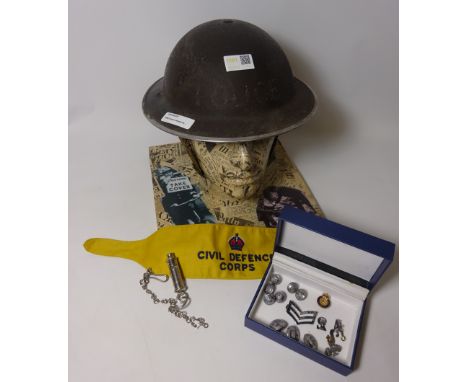 WWII Police helmet, with display head, 3 Tunic buttons, 6 cuff buttons, Sgt rank badge, whistle and chain, set of numbers etc