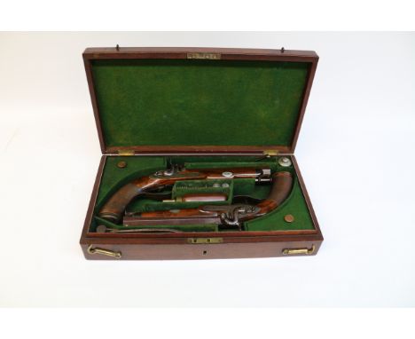 Fine cased pair of Officer's mid 19th century 14 bore percussion pistols by T K Baker London, with 16.5cm browned twist octag