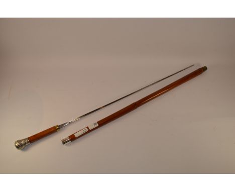 Victorian malacca swordstick with silver repousse handle hallmarked Birmingham 1890 and 69cm fullered steel rapier blade 89cm