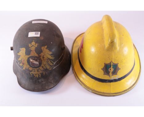 German WWII helmet and a 1989 pattern Fireman's helmet (2) Condition Report Click here for further images, condition, auction