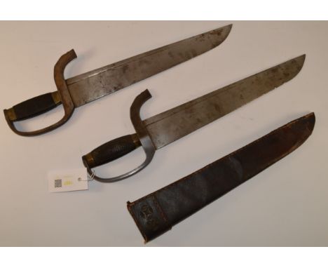 Pair early 20th century martial arts Hudiedao butterfly swords, 34cm blades, steel stirrup guards with chequered ebony grips 