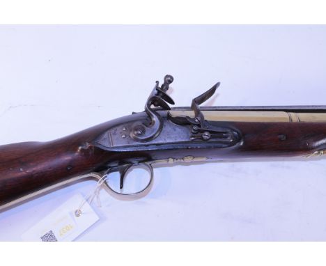 Mid 18th century brass barrelled flintlock Blunderbuss by North of Winchester, 37cm octagonal to round barrel fitted with spr